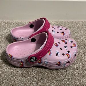 Girls pink crocs with rainbows. Size 10. Only worn twice and in great shape!